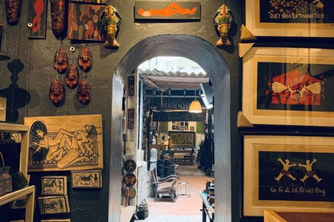 Exploring the authentic workshop of Ha Thai lacquer craft village on a Hanoi off the beaten path tour.