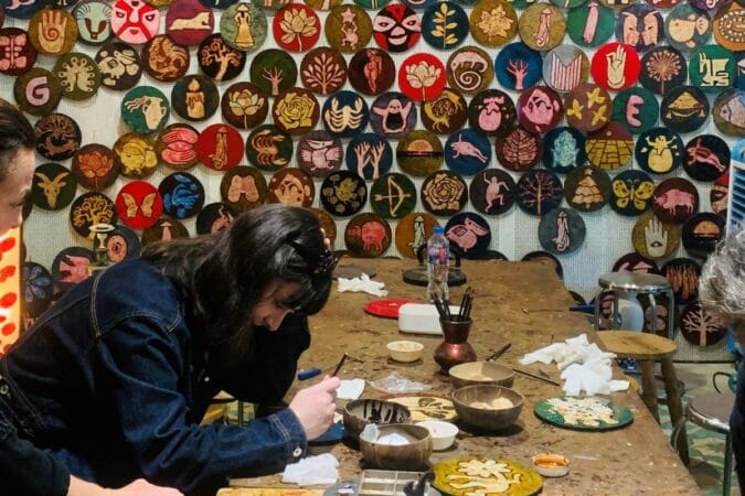 Handmade lacquer art during a Hanoi countryside tour to Ha Thai village.