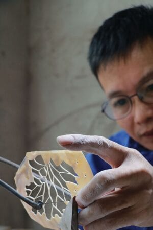 concentrating artisan mother of pearl inlay technique
