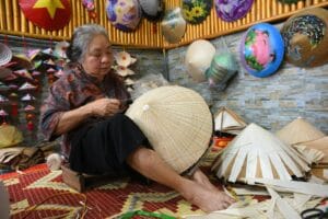 The conical hat artisan in Chuong village.